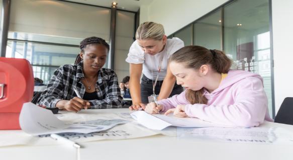 students working on a puzzle